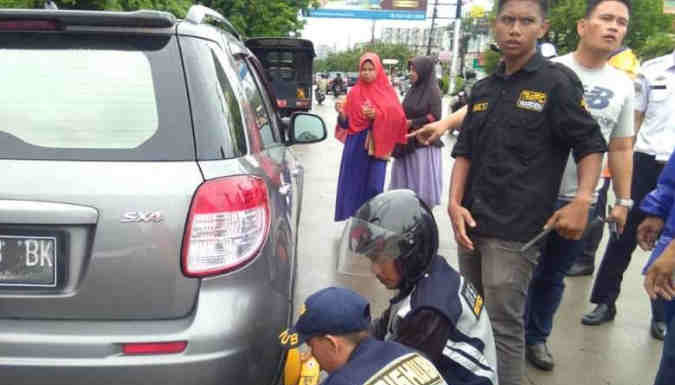 Fenomena Parkir Liar Di Jl. Pengayoman